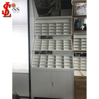 Support de lunettes de soleil de luxe avec éclairage LED pour l'aménagement intérieur des magasins d'optique dans les centres commerciaux