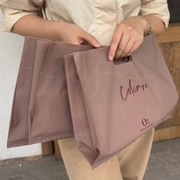 Sacs de shopping en plastique LDPE avec poignée découpée, imprimés avec un logo personnalisé, pour boutique, cadeaux, magasins de vêtements