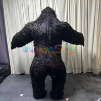 Costume de mascotte de gorille polaire à fourrure gonflable pour décorations de carnaval et publicité comprenant un accessoire de ventilateur