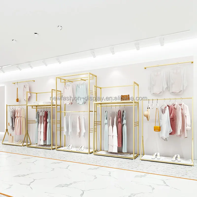 Negozio di abbigliamento personalizzato montaggio a parete porta abiti porta abiti in metallo espositore per abbigliamento in acciaio inossidabile lucido oro per negozio
