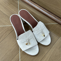 Sandales plates d'été en cuir véritable de créateur pour femmes, chaussures décontractées d'extérieur, style italien de luxe
