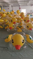 Tube gonflable de piscine en PVC avec flotteurs d'eau de canard jaune transparent clair et jouets d'anneaux