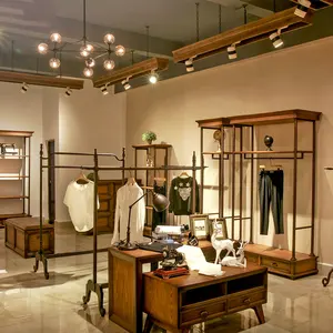 Scaffale moderno del negozio di modo dello scaffale di esposizione al dettaglio dell'abbigliamento di fascia alta su ordinazione