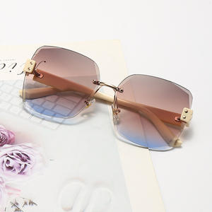 Lunettes de soleil sans monture de style coréen pour femmes, UV400, grandes lentilles carrées, légères, en nylon TR90, protection solaire, pour l'extérieur - Product Image 1