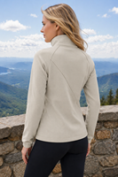 Veste athlétique personnalisée à col montant et fermeture éclair intégrale pour femme, texture micro-gradée, manches raglan, poches zippées, coupe ajustée légère