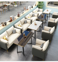 Ensemble table et chaises de restaurant/hôtel au design moderne et épuré avec plateau en ardoise, structure en fer et canapé en cuir PU pour cafés commerciaux