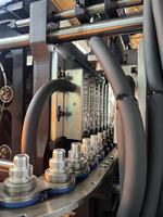 Machine de soufflage de bouteilles PET entièrement automatique à 6 cavités avec PLC pour bouteilles d'eau potable et de jus de 200 ml à 1500 ml