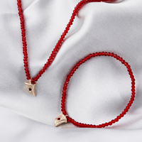 Collier et Bracelet à quatre points pour femmes, ensemble de collier et de boucles d'oreilles en cristal rubis, perles d'émeraude, strass