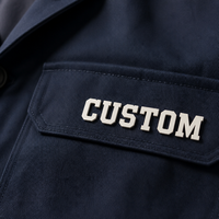 Logo en silicone personnalisé OEM pour vêtements de travail, emblème tissé en relief pour uniforme d'entreprise, fabricant de badges 3D en relief