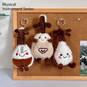 Brinquedos Musicais de Pelúcia Adoráveis por Atacado: Violino, Guitarra, Piano, Tambor Redondo, Bonecos de Pelúcia, Presentes de Instrumentos Musicais para Crianças, Chaveiro Musical - Product Image 1