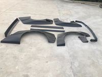 Pour BMW E30 : Jupes latérales en fibre de carbone, ailerons avant et arrière, couvercle de coffre, pare-chocs avant et arrière, et extensions de garde-boue.