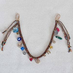 Porte-clés léger pour femme, style dessin animé, avec pendentif sac à main, motif œil de démon, géométrie métallique et cœur tressé, au design tendance et original - Product Image 4