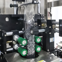 Machine d'étiquetage automatique à manchon rétractable, ligne d'emballage de bouteilles à grande vitesse pour les boissons et les cosmétiques