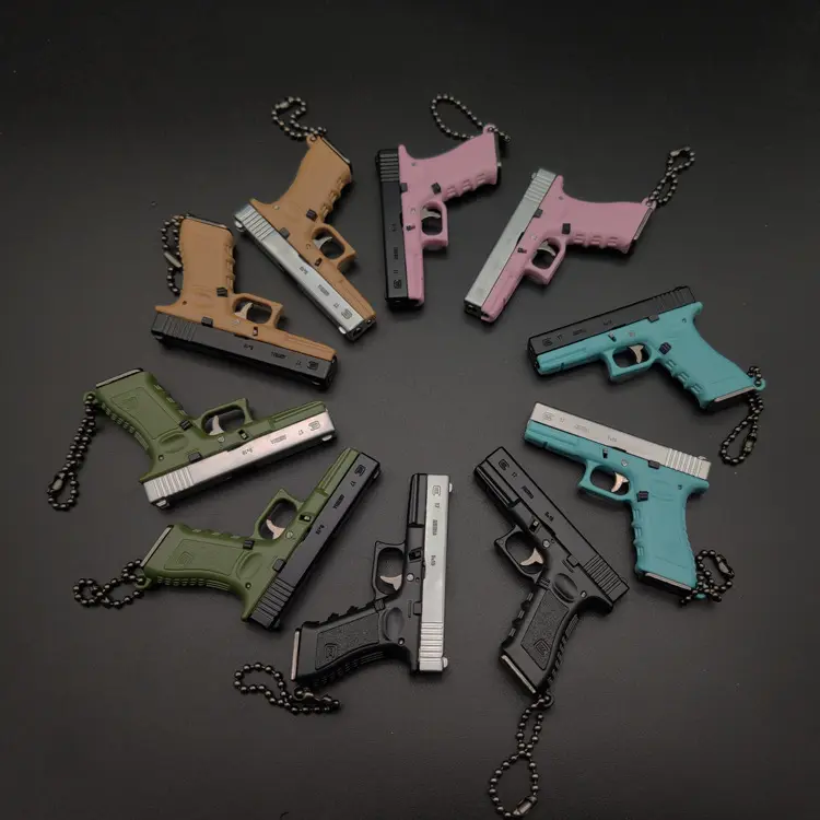 新しいファッションシミュレーション食べるチキンゲームプラスチックキーホルダーミニメタルモデルおもちゃ銃キーホルダー