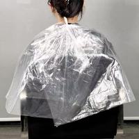 Cape de barbier jetable transparente et imperméable en plastique PE, bavette de coiffure pour salons de coiffure