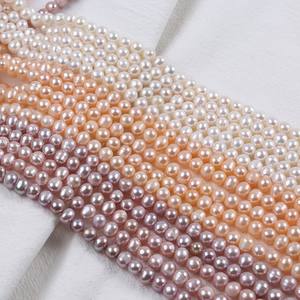 Perles d'eau douce blanches presque rondes de 6-7 mm en gros de Zhuji, perles naturelles semi-finies pour le bricolage - Product Image 1