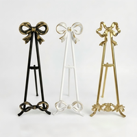 Nouveau support de présentation en métal avec nœud papillon, style nordique moderne, pour décoration de table, mini chevalet, cadre en fer robuste pour la décoration intérieure