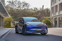 Kit carrosserie en fibre de carbone sèche style PK pour Tesla Model Y : Lame avant, jupes latérales, diffuseur arrière et aileron arrière en fibre de carbone sèche