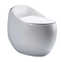 WC en céramique moderne blanc brillant en forme d'œuf, monobloc à jupe, à double chasse, à sortie verticale, économie d'eau, pour hôtels et villas