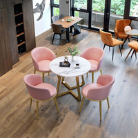 Petite table à manger italienne légère et moderne de luxe Combinaison de chaises en métal pour la maison, le bureau et l'appartement-pour la réception et les loisirs