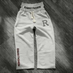 Pantalon de sport brodé personnalisé avec double ceinture et cordon de serrage, style vintage oversize pour hommes et femmes, par fabricant OEM - Product Image 1