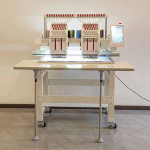 Б/у двухголовочная плосковязальная вышивальная машина Dahao Pro для пошива одежды, компьютеризированная - Product Image 2