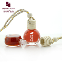 Bouteille de diffuseur suspendue de voiture vide Mini désodorisant bouteille en verre de parfum d'huile essentielle avec bouchon en bois noir forme de larme