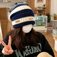   Bonnet d'hiver en tricot torsadé épais et confortable pour femme, avec pompon mignon, indispensable par temps froid