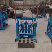 Machine mobile économique à 3 trous pour la fabrication de blocs de béton, de pavés creux en ciment et de briques autobloquantes