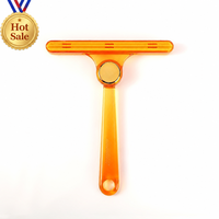 Brosse anti-poils en ABS en forme de T, orange translucide, réutilisable, grattoir à poils d'animaux, nettoyeur de fourrure à dents jaunes pour vêtements et literie