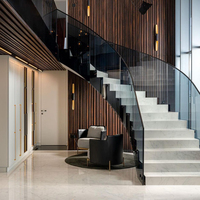 Escalier incurvé en marbre gris pour l'extérieur des bâtiments, design simple, pour garde-corps en fer, à vendre