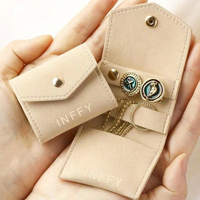 Petit sac de pochette à bijoux en similicuir personnalisé sac de conteneur à bijoux portable multifonctionnel de luxe pour boucle d'oreille et anneau