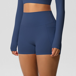 Shorts de ciclista de cintura alta para mujer al por mayor con bolsillo para teléfono, efecto melocotón, control de abdomen, transpirables, elásticos, para yoga y fitness OEM ODM - Product Image 3