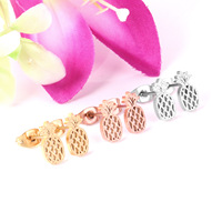 Usine de commerce extérieur Design de mode Boucles d'oreilles en acier inoxydable Ananas creux Cadeau en gros Dames