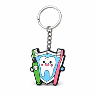 Porte-clés en caoutchouc de haute qualité pour soins dentaires, breloque mignonne en forme de brosse à dents, idéal pour promotion de clinique dentaire, cadeau en gros