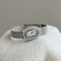Montre à quartz pour femme Scottie 9762, ovale, incrustée de diamants, motif tournesol et épis de blé, bracelet en acier inoxydable, boîtier en alliage