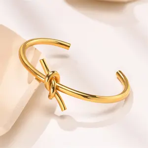 Hot selling water proof stainless steel gold plated knot bangle open cuff bracelet for women