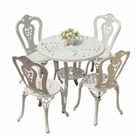 Vente en gros usine – Ensemble de mobilier de jardin en aluminium moulé couleur personnalisée, table et chaises de patio gravées de luxe pour villas, hôtels et complexes hôteliers