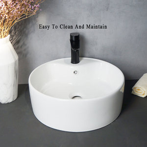 Tarpul Articles sanitaires modernes : Lavabo rond en céramique blanc à poser, design artistique, pour salle de bain d'hôtel - Product Image 3