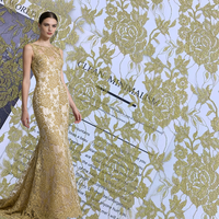 Tissu floral en fil d'or brillant élégant de luxe en gros pour robe de mariée, robe de soirée, robe de fête