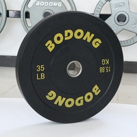 Plaques de poids de pare-chocs de musculation en caoutchouc noir 100 + livres équipement de Fitness de gymnastique haltérophilie plaque d'haltères pour poids libres