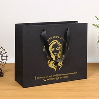 Emballage de cadeau de bijoux de mode personnalisé vêtements sacs en papier bleus à provisions avec logo