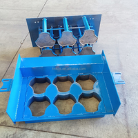 Les fabricants chinois produisent une machine à blocs de briques creuse en béton sans moteur bon marché et facile à utiliser