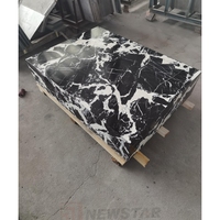 Table basse ronde moderne en marbre Calacatta noir, œuvre d'art unique faite à la main, nouveau modèle