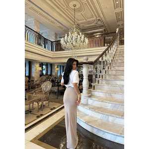 Jupe longue vintage en cuir beige avec détail rose, style portefeuille plissé, volants tricotés, imprimé décoratif, taille naturelle pour le printemps - Product Image 1