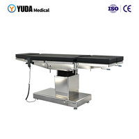 Table d'opération électrique mobile avec étriers en acier inoxydable pour clinique orthopédique ISO 9001/13485 Yuda Medical DST-1A pour bloc opératoire