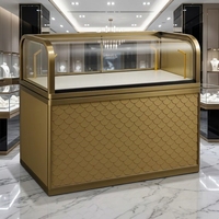 Vitrine à bijoux moderne de luxe, en fer, verre trempé, éclairage LED, pour centre commercial, vente au détail, construction en bois MDF durable, personnalisable