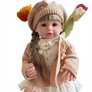Poupée de simulation de naissance de 55 cm en silicone souple avec cheveux tressés, jouet compagnon pour enfants, vente en gros transfrontalière, succès TikTok - Product Image 1