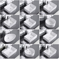Vente en gros d'usine Hôtel Céramique Salle de bain Lavabo Évier Articles sanitaires Comptoir en céramique blanche Bassin d'art
