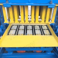Machine à fabriquer des blocs de béton semi-automatique QT4-40, machine de moulage en Afrique